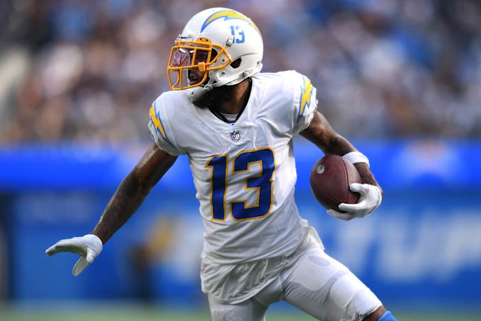 Sep 19, 2021; Inglewood, California, USA; Los Angeles Chargers wide receiver Keenan Allen (13) runs with the ball after a catch against the Dallas Cowboys during the second half at SoFi Stadium. Mandatory Credit: Orlando Ramirez-USA TODAY Sports